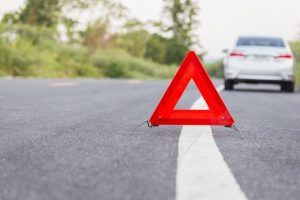 Warning triangle on a road