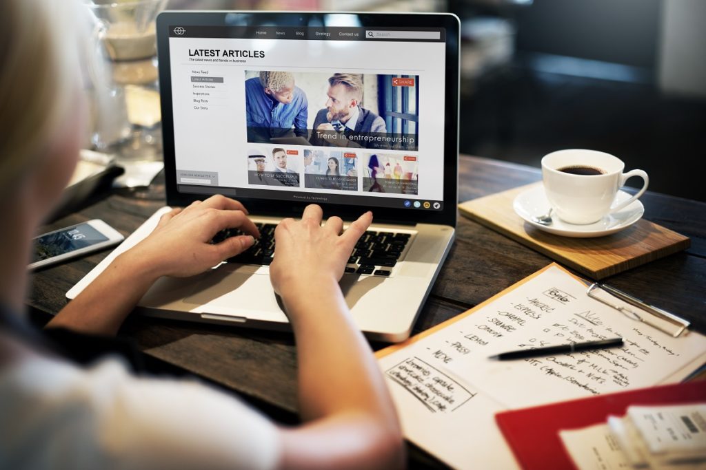 Woman reading an online article