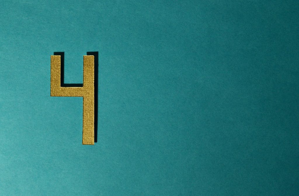 number four in a green background