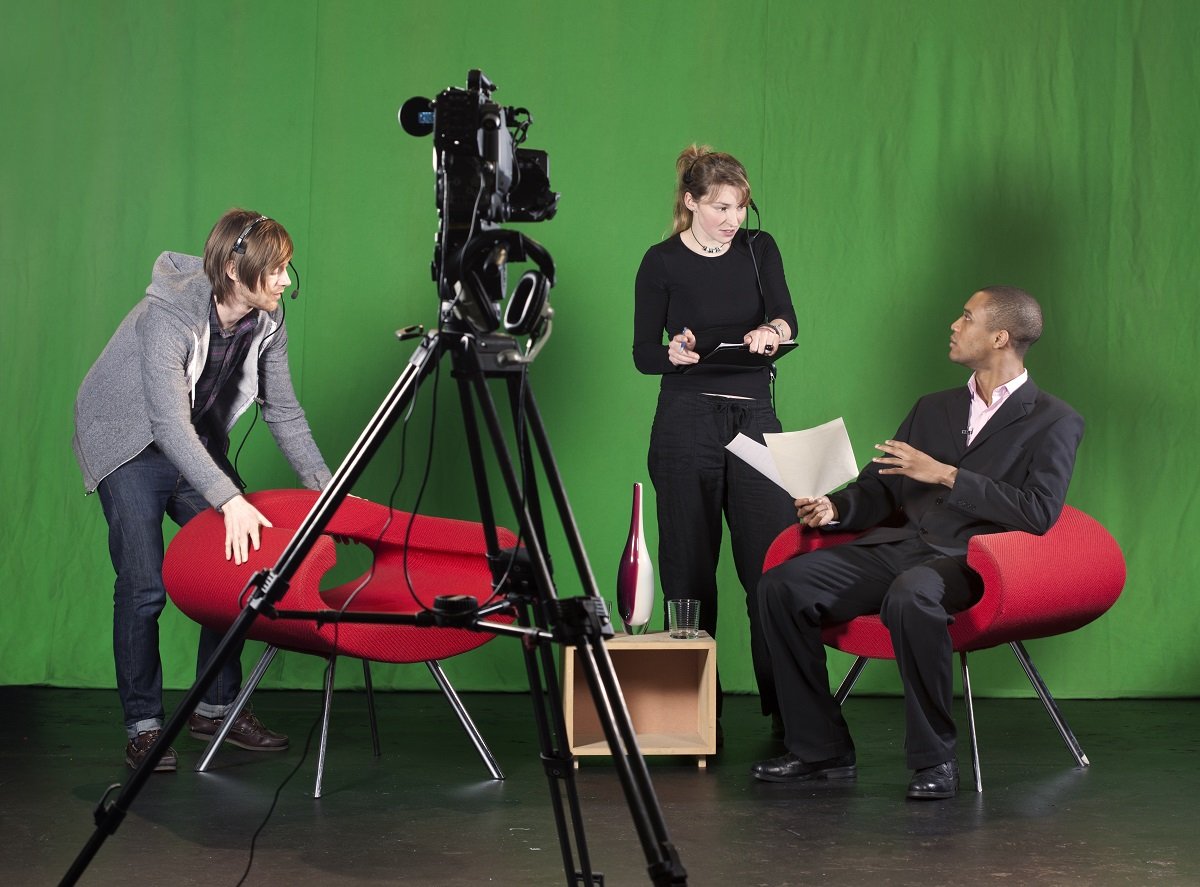 Cast and crew of production at work